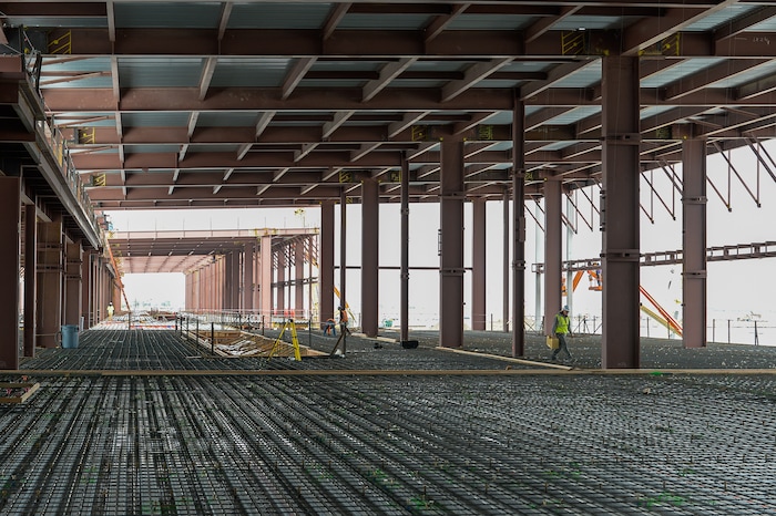 (Francisco Kjolseth  |  The Salt Lake Tribune)  The Salt Lake City Department of Airports gives a tour of the progress being made to replace the three aging terminals with a single central terminal building. Over time, the existing terminal, parking garage and concourses will be completely demolished and replaced with an estimated completion date of 2025.