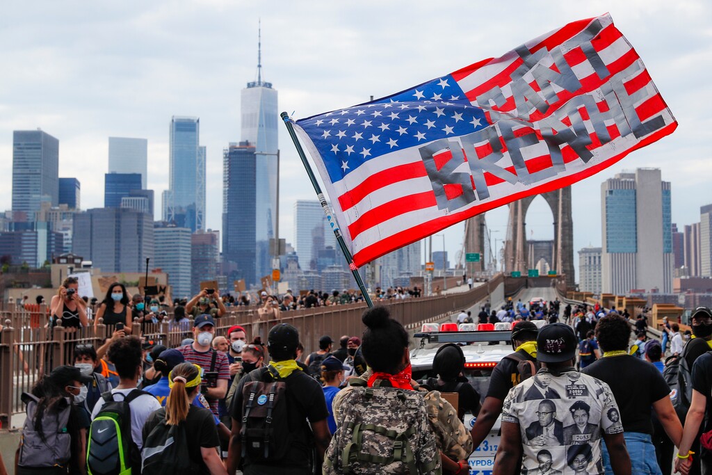 (John Minchillo | AP) Protesters march on the Brooklyn Bridge after a rally in Cadman Plaza Park, Thursday, June 4, 2020, in New York. Protests continued following the death of George Floyd, who died after being restrained by Minneapolis police officers on May 25.