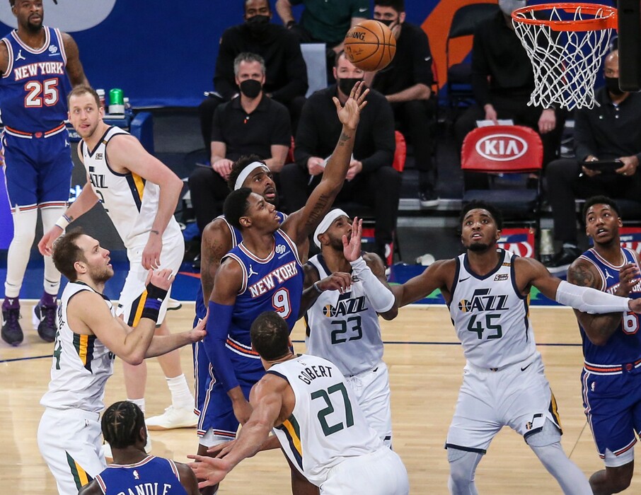 New York Knicks guard RJ Barrett (9) shoots in front of Utah Jazz center Rudy Gobert (27) during the first half of an NBA basketball game Wednesday, Jan. 6, 2021, in New York. (Wendell Cruz/Pool Photo via AP)