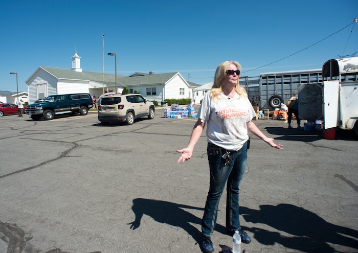 (Rick Egan  |  The Salt Lake Tribune)       Christine Hansen talks about how her home was spared in the Dollar Ridge Fire near Fruitland, Tuesday, July 10, 2018.


