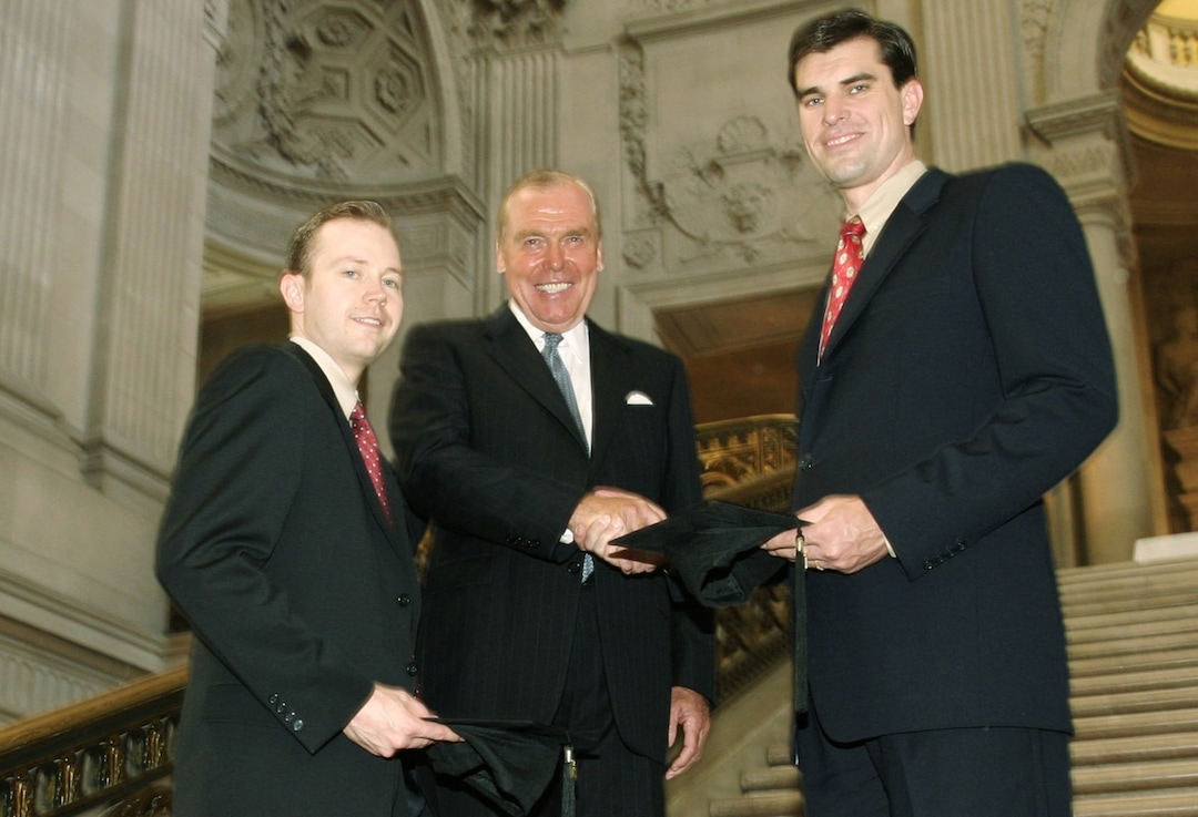 (Tribune file photo) L to R: Clarke Nelson. Jon Huntsman and Patrick Kilbourne, of Salt Lake City at the Graduation of the Wharton School of the Univeristy of Pennsylvania's first West Coast MBA for Executives class in San Francisco. on August 28, 2003.