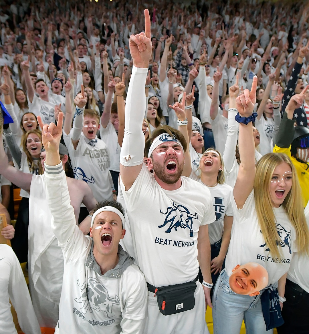 (Eli Lucero  |  The Herald Journal via AP) Utah State students cheer during the team's NCAA college basketball game against Nevada on Saturday, March 2, 2019, in Logan, Utah.