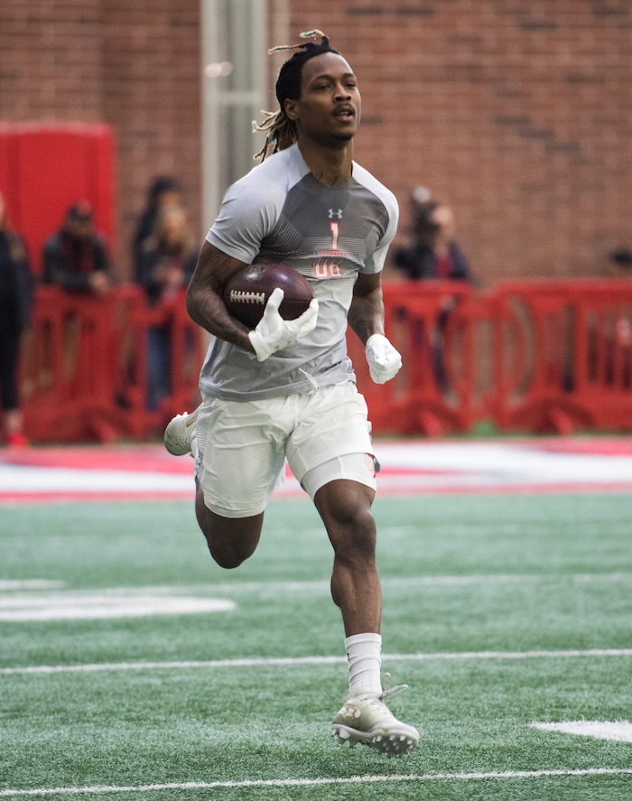 (Rick Egan  |  The Salt Lake Tribune)      Boobie Hobbs runs with the ball, after catching a pass, during University of Utah's 2018 Pro Day for NFL scouts, at Spence Eccles Field House, Wednesday, March 28, 2018.