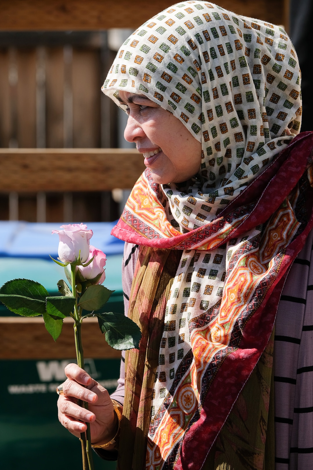 (Francisco Kjolseth  |  The Salt Lake Tribune)  Lufta Samad holds a rose given by a supporter after attending Friday prayer services at the small Al Sahaba Mosque in Orem. Utah County Commissioner Tanner Ainge organized a "flash mob of solidarity," in response to the Muslim shootings in New Zealand. 