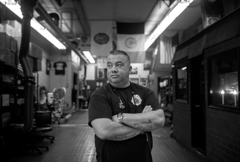 (Kirsten Luce for The New York Times) 

Anthony Almojera standing inside his emergency medical services station.