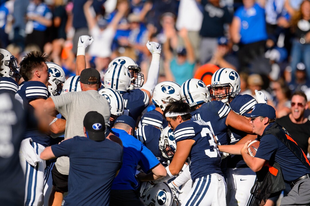 (Trent Nelson  |  The Salt Lake Tribune)  BYU celebrates after Brigham Young Cougars defensive back Dayan Ghanwoloku (5) makes a game-winning interception in overtime as BYU hosts USC, NCAA football in Provo on Saturday Sept. 14, 2019.