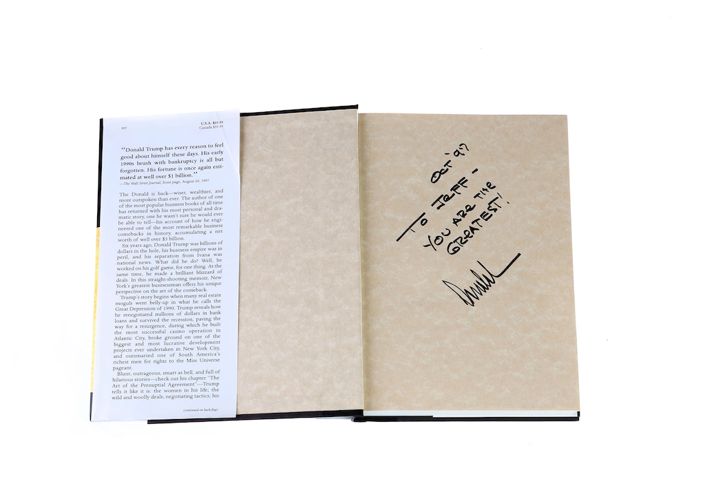 (Alessandra Montalto | The New York Times) A photo of an inscription in a copy of Donald Trump's book "Trump: The Art of the Comeback" that belonged to Jeffrey Epstein. Trump has tried to minimize his friendship with Epstein, but documents and interviews reveal an intense and complicated relationship. Chasing women was a game of ego and dominance. Female bodies were currency.