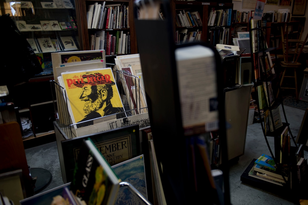 (Jeremy Harmon  |  The Salt Lake Tribune) A vintage Pete Seeger poster is seen among items for sale at Ken Sanders Rare Books in Salt Lake City on January 16, 2020.
