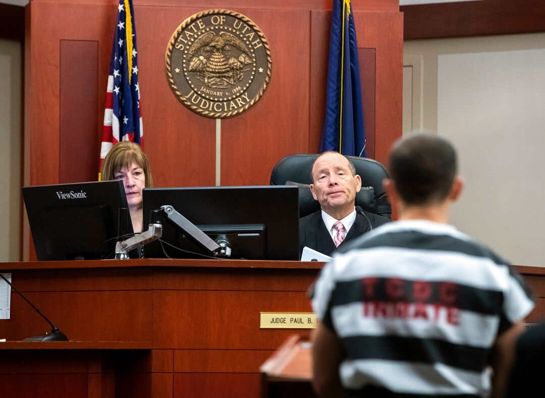 (Scott G Winterton  |  Deseret News/Pool) Juvenile Judge Renee Jiminez sits in with Judge Paul B. Parker on Friday, Dec. 13, 2019. Utah's juvenile judges will soon begin taking on cases in adult court, a move to help relieve crowded courtrooms in the state's most populated judicial district.