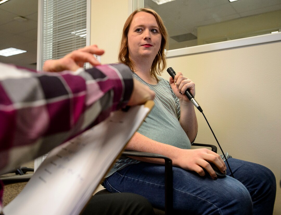 (Steve Griffin  |  The Salt Lake Tribune) Jordan Gabbitas, works with students Timothy Baker and Abbey Lasek as she uses computer software at Rocky  Mountain University to help the consistency of her voice. The speech clinic helps transgender individuals match their voice to their gender. She was at the Provo, Utah clinic Tuesday January 16, 2018.
