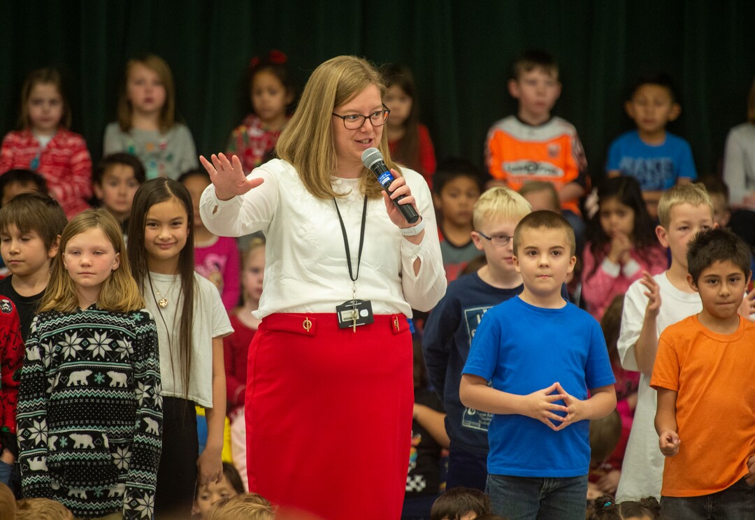 (Rick Egan  |  The Salt Lake Tribune)   Ms. Worthington, principal of Oquirrh Elementary school, talks to her students during a Christmas assembly, before surprising all 650 students at her school with the gift-wrapped boxes of cereal, at Oquirrh Elementary in West Jordan, Thursday, Dec. 20, 2018.