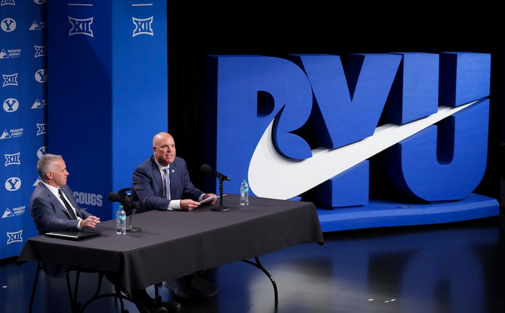 (Bethany Baker | The Salt Lake Tribune) Brian Santiago, right, speaks beside BYU President Shane Reese during a press conference following the announcement of Santiago as the new BYU athletic director at Brigham Young University in Provo on Wednesday, May 14, 2025.