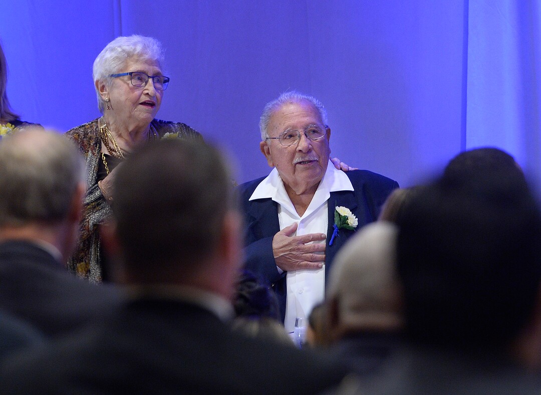 (Scott Sommerdorf   |  The Salt Lake Tribune)   Retired Educator, Latino Activist, and Civil Rights Advocate Robert "Archie" Archuleta, and his wife Lois, left, recite the pledge of allegiance prior to Archuleta being honored with the Albert Fritz Civil Rights Worker of the Year Award by the Salt Lake branch of the NAACP, Friday, October 27, 2017. 
