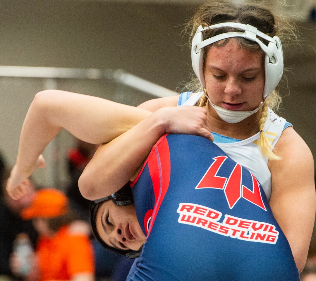 (Rick Egan | The Salt Lake Tribune)  Lizzie Shunn (Westlake) wrestles Hotaia Valeti (Springville) in the girls 140 division, at the High School All Star wrestling event in Orem, on Tuesday, Jan. 12, 2021.