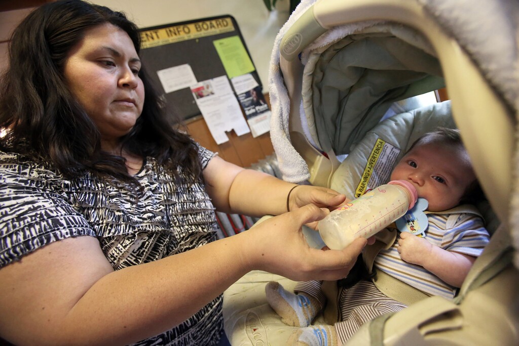 Francisco Kjolseth | Tribune file photo
Alejandra Castro, 34, shows up at the Crossroads Urban Center in Salt Lake with her 1-month-old Alejandro Ruz in hopes of getting baby formula for her son in 2013. With the Federal shut down taking effect, women who rely on the federally funded WIC (Women, Infants and Children) are unable to get baby formula.