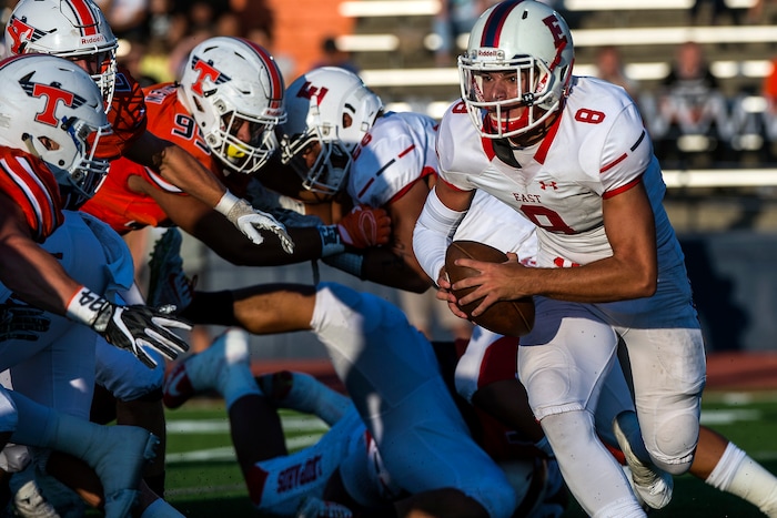 (Chris Detrick  |  The Salt Lake Tribune)  East's Ben Ford (8) runs the ball during the game at Timpview High School Thursday, August 17, 2017. 