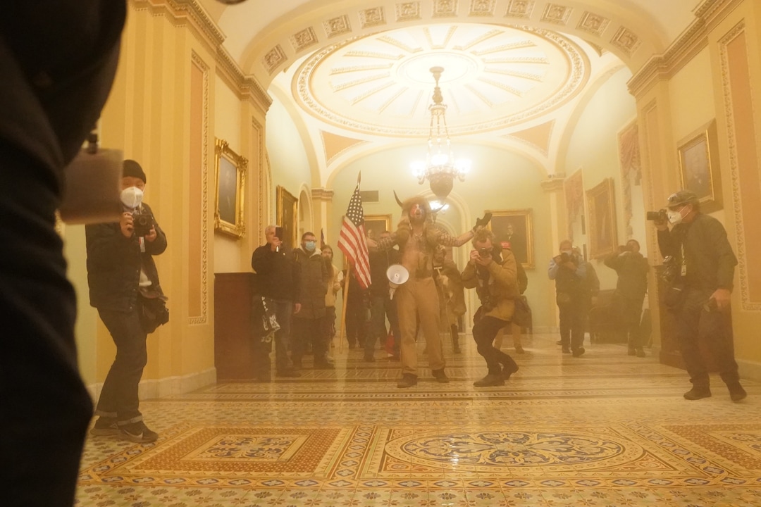 (Erin Schaff | The New York Times) People protesting the presidential election results inside the Capitol in Washington on Wednesday, Jan. 6, 2020. The Capitol building was placed on lockdown, with senators and members of the House locked inside their chambers, as Congress began debating President-elect Joe Biden’s victory. President Trump addressed supporters near the White House before protesters marched to Capitol Hill.