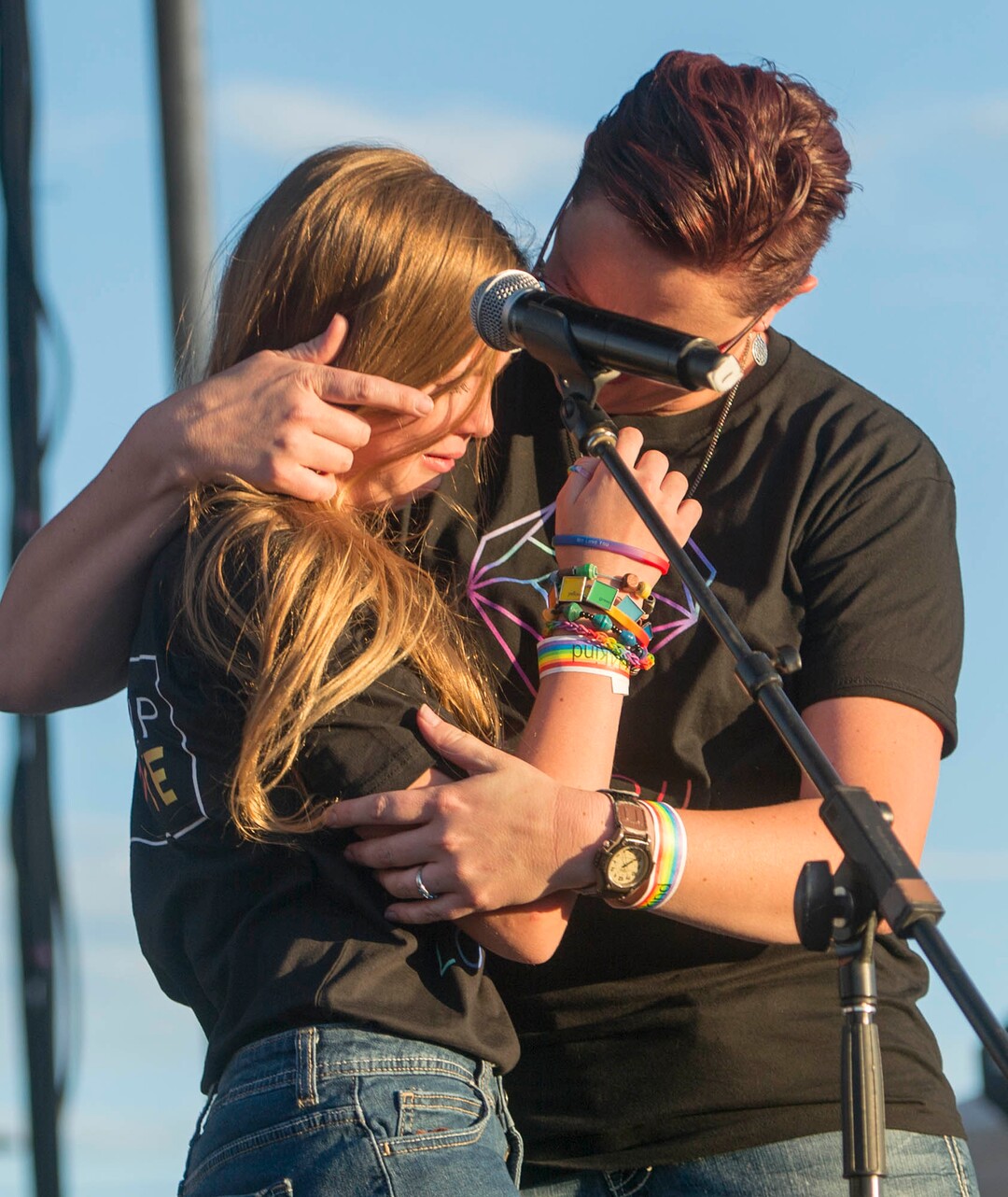 (Rick Egan  |  The Salt Lake Tribune)Savannah hugs her mother Heather Kester after saying a few words on stage at the LoveLoud Festival at Brent Brown Ballpark at UVU campus, Saturday, August 26, 2017.