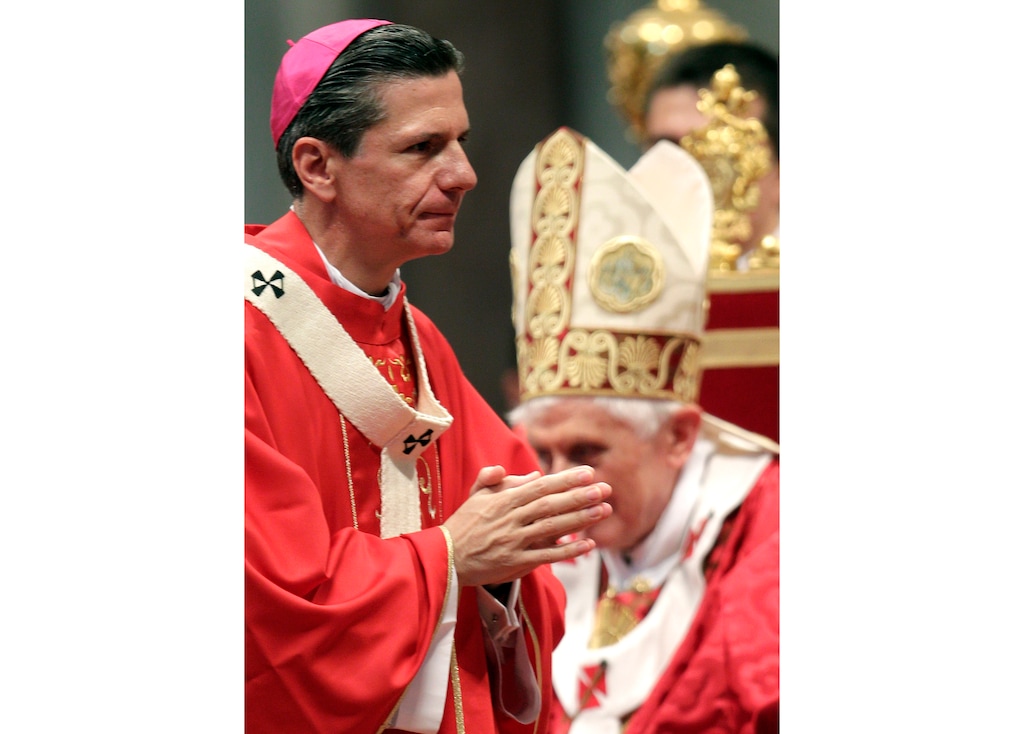 (AP Photo/Pier Paolo Cito, File) In this Wednesday, June 29, 2011, file photo, Gustavo Garcia-Siller, archbishop of San Antonio, leaves the altar after receiving the pallium from Pope Benedict XVI, a woolen shawl symbolizing his bond to the Pope, in St. Peter's Basilica at the Vatican. Garcia-Siller used his personal Twitter account late Monday, Aug. 5, 2019, to post tweets that were critical of President Donald Trump.
