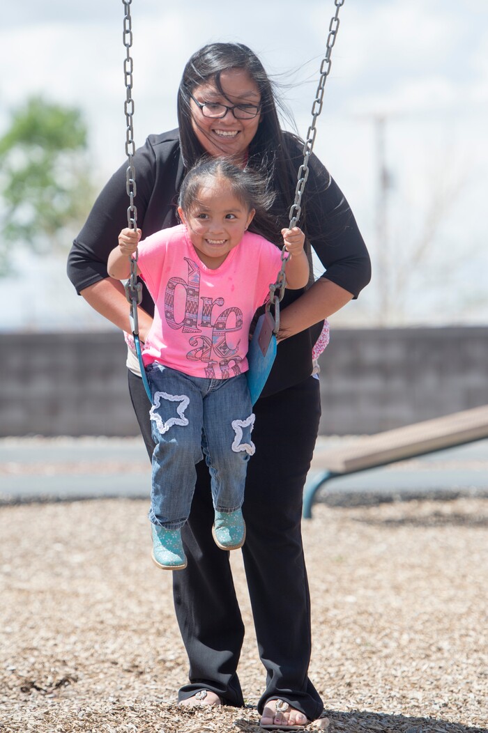 (Rick Egan  |  Tribune File Photo)  Laurel Yellowhorse plays with her 3-year-old daughter RaeLynn, at the playground near the Paiute Tribal office in Cedar City, Wednesday, May 6, 2015.