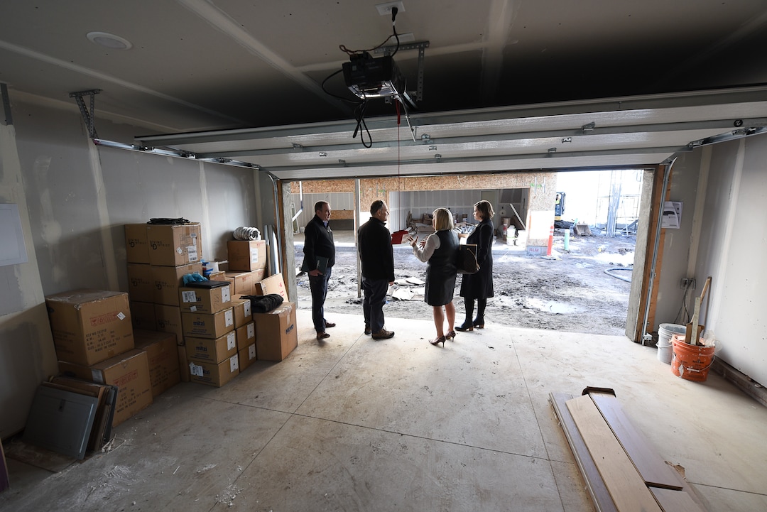 (Francisco Kjolseth  |  The Salt Lake Tribune)  People tour the new 23-unit modern townhome project called "theEDITH," one of several in-fill townhomes projects by the company called CW Urban takes shape as it gets ready to open on the southwest corner of 1700 South and West Temple in Salt Lake City. The three story buildings will offer three unique floor plans ranging from 1545-1964 total square feet with 2-3 bedrooms, 2-3 baths and 1-2 car garage. 