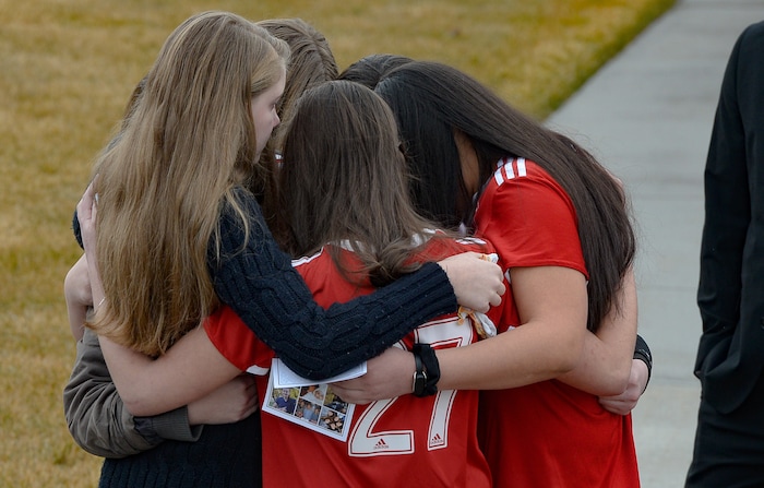 (Francisco Kjolseth  |  The Salt Lake Tribune) People embrace at the conclusion of funeral services for Consuelo Alejandra Haynie and her children Milan, 12, Alexis, 15 and Matthews, 14, in Grantsville on Friday, Jan. 24, 2020. The killing of the Utah mother and three of her children by a gunman identified by police as her 16-year-old son is "nearly unbearable" for the father who survived, a lawyer said Thursday, Jan. 23, 2020.