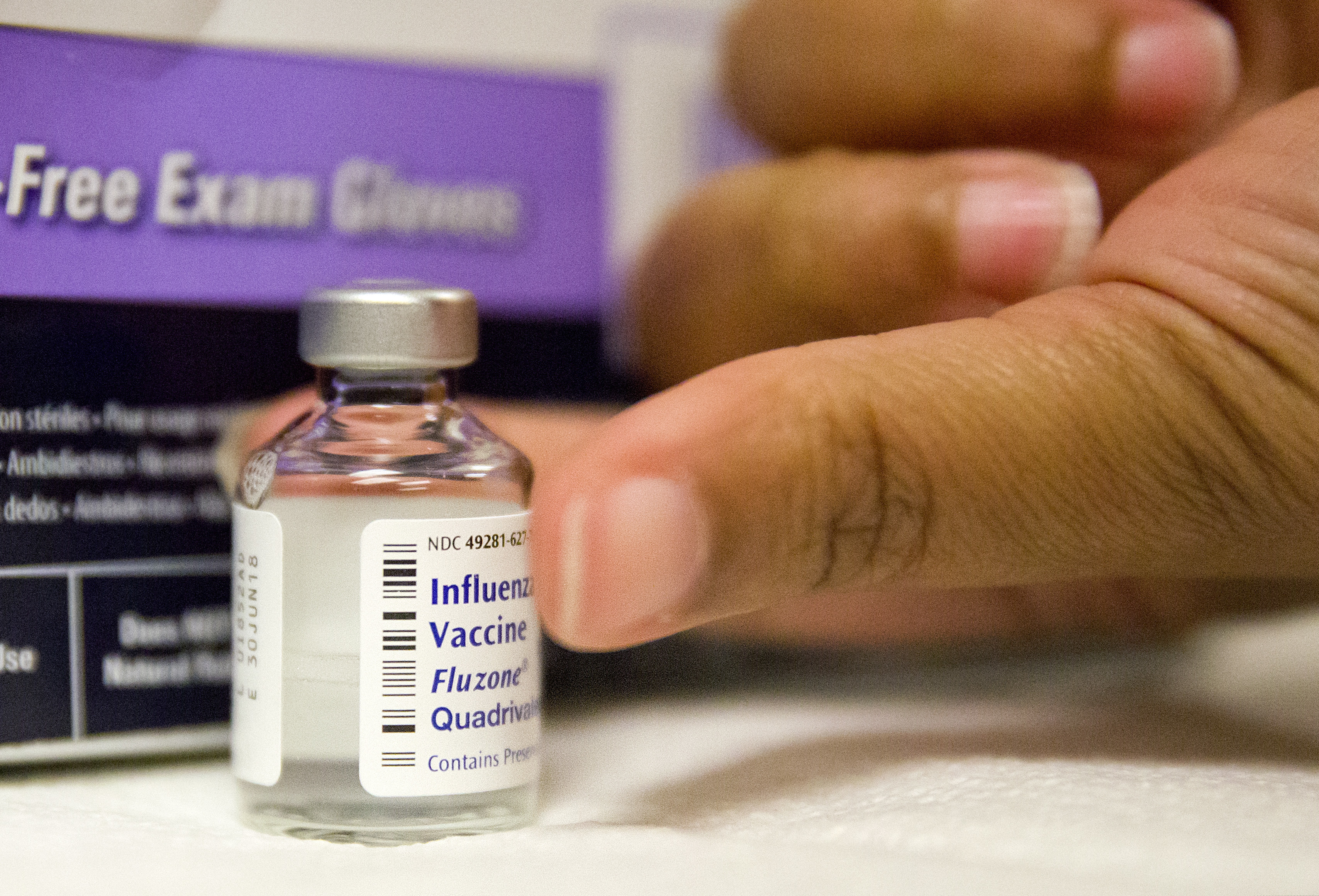 (David Goldman | The Associated Press) In this Wednesday, Feb. 7, 2018 file photo, a nurse prepares a flu shot from a vaccine vial at the Salvation Army in Atlanta. Preliminary figures released Thursday, Feb. 14, 2019 suggest this winter’s vaccine is 47 percent effective overall in preventing flu illness severe enough to send a patient to the doctor's office - an improvement from the previous year.