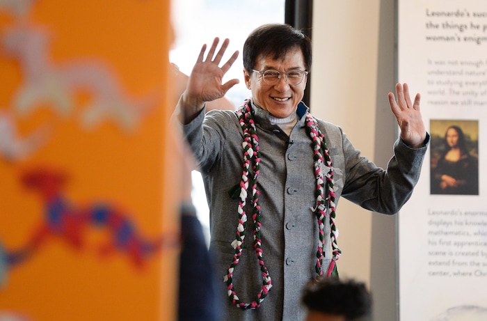 (Francisco Kjolseth | The Salt Lake Tribune) Jackie Chan waves goodbye to Mountain View Elementary students following a workshop as part of a preview of Jackie ChanÕs Inaugural Environmental Exhibition ÔJackie Chan: Green HeroÕ at The Leonardo: Museum of Creativity and Innovation on Thursday, Jan. 24, 2019.
