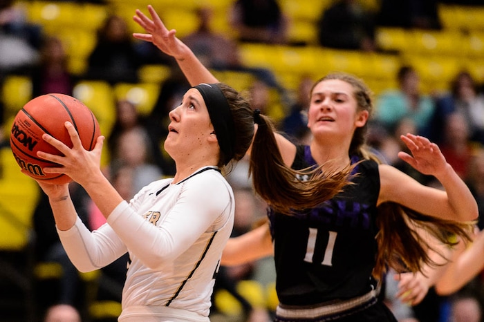 (Trent Nelson | The Salt Lake Tribune)
Lehi vs. Desert Hills, 4A State high school basketball tournament at Utah Valley University in Orem, Thursday March 1, 2018. Desert Hills's Kylee Westhoff defended by Lehi's Samantha Lewis (11).