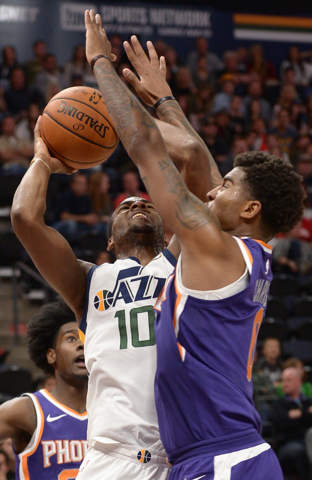 (Leah Hogsten  |  The Salt Lake Tribune)  Utah Jazz guard Alec Burks (10) tries to get past Phoenix Suns forward Marquese Chriss (0). The Utah Jazz defeated the Phoenix Suns 112-101 during preseason NBA basketball at Vivint Smart Home Arena in Salt Lake City, October 6, 2017.