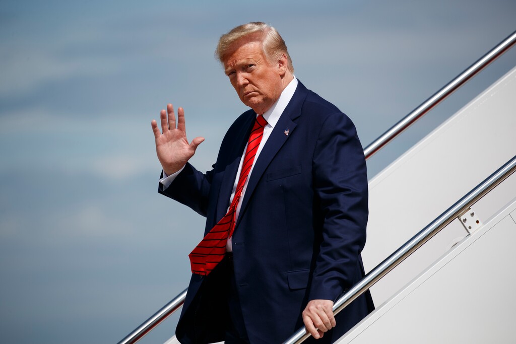 (Evan Vucci | AP file photo) President Donald Trump waves to reporters as he steps off Air Force One after arriving at Andrews Air Force Base, in Andrews Air Force Base, Md., on Sept. 26, 2019. A whistle blew, an impeachment inquiry swung into motion and the president at the center of it all rose defiantly to his own defense, not always in command of the facts.