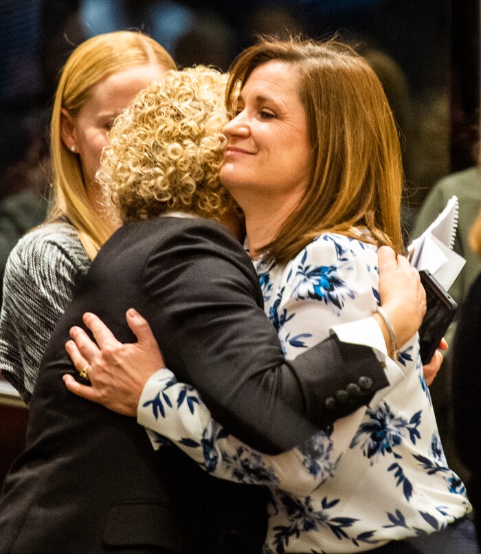 (Rick Egan  |  The Salt Lake Tribune)     Jenny Wilson hugs Salt Lake City Mayor, Jackie Biskupski , after being sworn in as the new Salt Lake County Mayor by Salt Lake County Clerk, Sherrie Swensen, Tuesday, Jan. 29, 2019.
