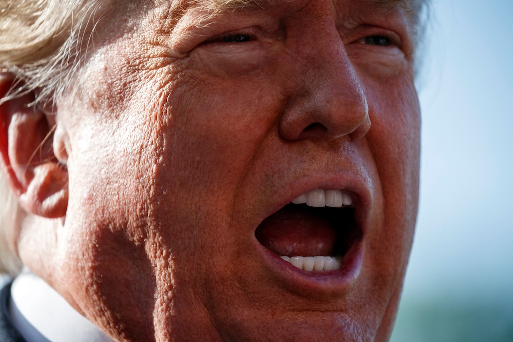 President Donald Trump talks with reporters before departing on Marine One for the Air Force Academy graduation ceremony, Thursday, May 30, 2019, in Washington. (AP Photo/Evan Vucci)