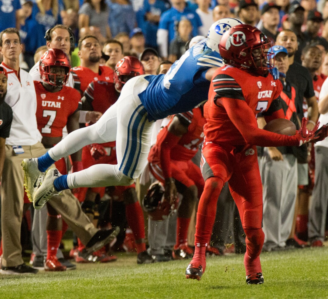 (Rick Egan  |  The Salt Lake Tribune)  Utah Utes defensive back Jaylon Johnson (7) intercepts a pass intended for Brigham Young Cougars wide receiver Talon Shumway (21), in football action BYU vs Utah, at Lavell Edwards Stadium in Provo, Saturday, September 9, 2017.