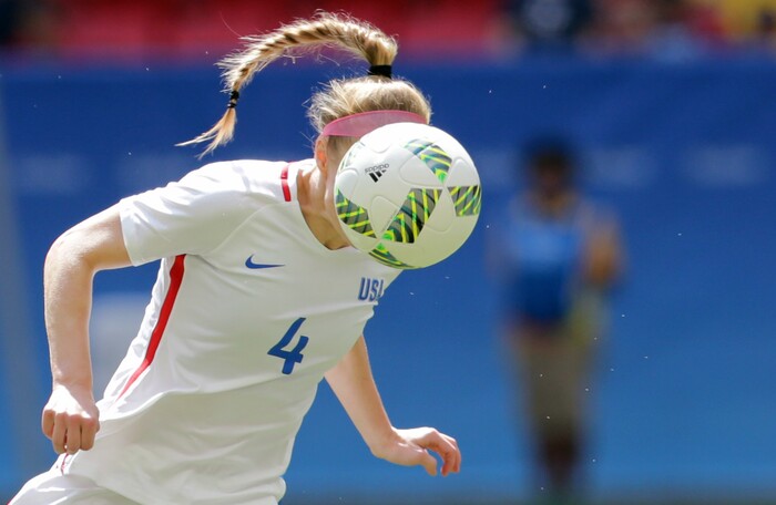 United States' Becky Sauerbrunn hits a header during a quarter-finals match of the women's Olympic football tournament between the United States and Sweden in Brasilia Friday Aug. 12, 2016.(AP Photo/Eraldo Peres)