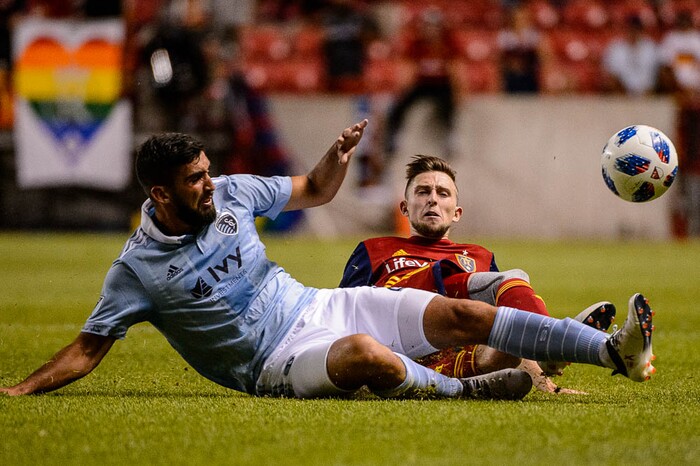 (Trent Nelson | The Salt Lake Tribune)
Sporting Kansas City defender Emiliano Amor (22) and Andrew Brody slide for the ball as Real Salt Lake hosts Sporting Kansas City in a U.S. Open Cup match in Sandy, Wednesday June 6, 2018.