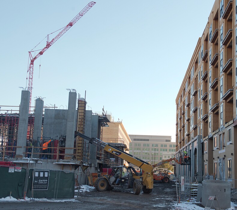 (Tyler Cobb  |  The Salt Lake Tribune)  Construction crews work on the apartment buildings at the Hardware District in Salt Lake City on Tuesday January 23, 2018.
