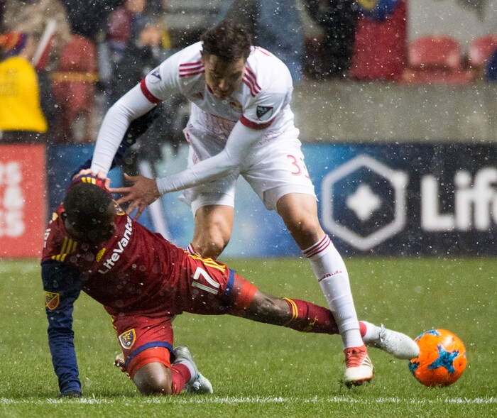 (Rick Egan  |  The Salt Lake Tribune)      New York Red Bulls midfielder Aaron Long (33) collides with Real Salt Lake midfielder Demar Phillips (17), in MLS action between Real Salt Lake and New York Red Bulls at Rio Tinto Stadium, Saturday, March 17, 2018.


