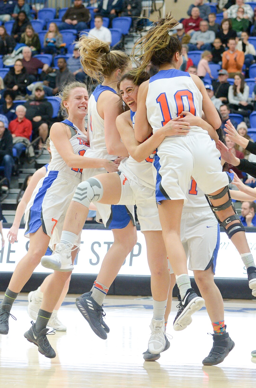 (Leah Hogsten  |  The Salt Lake Tribune) Timpview celebrates the win.  Timpview defeated Skyline 56-49 in their semifinal game of the 5A High School Girls' Basketball Tournament at SLCC in Taylorsville, Friday, Feb. 23, 2018. 
