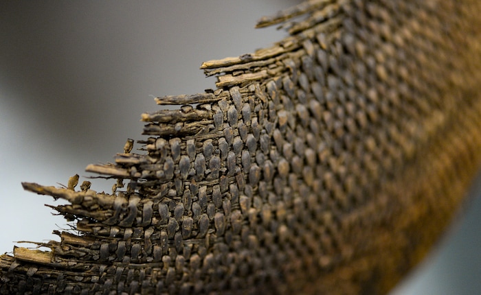 (Francisco Kjolseth  |  The Salt Lake Tribune)  A basket with woven-in figures from San Juan County is on display as part of the annual Behind The Scenes event at The Natural History Museum of Utah on Saturday, Nov. 16, 2019, one of many from the Byron Cunningham collection.