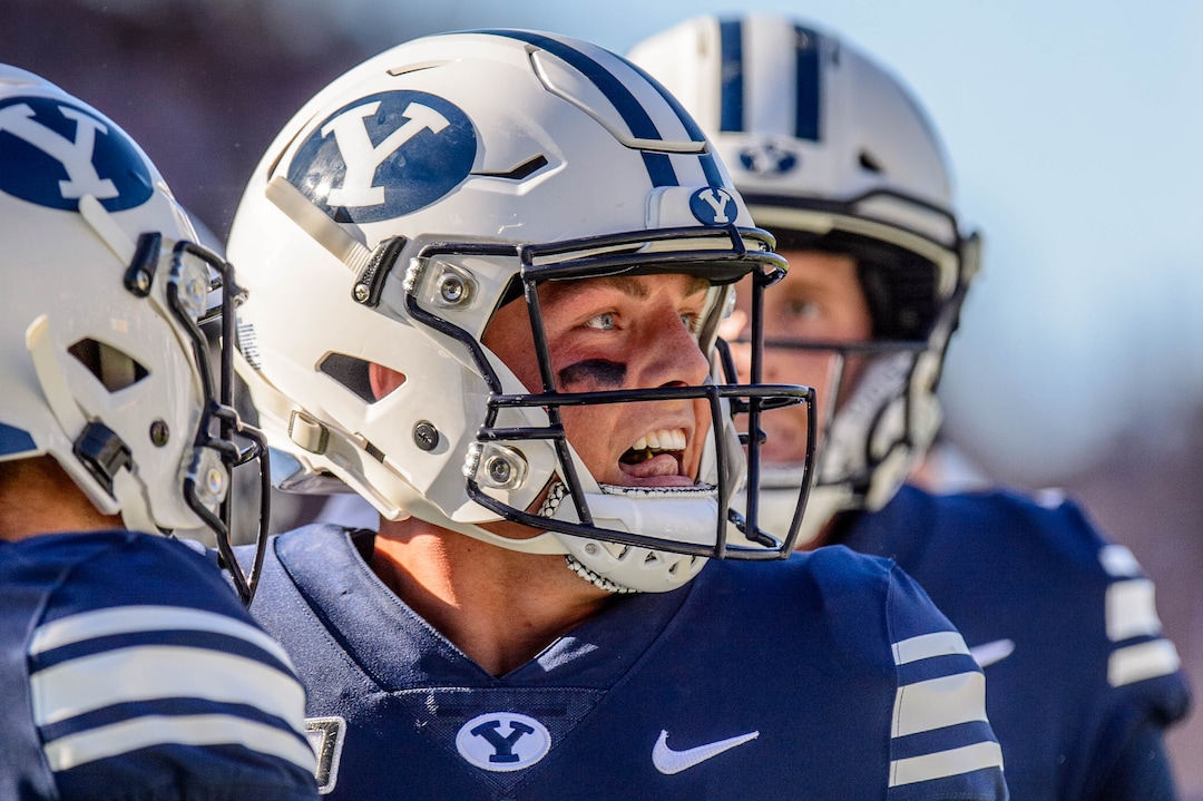 (Trent Nelson  |  The Salt Lake Tribune)  Brigham Young Cougars quarterback Zach Wilson (1) celebrates a late touchdown as BYU hosts USC, NCAA football in Provo on Saturday Sept. 14, 2019.