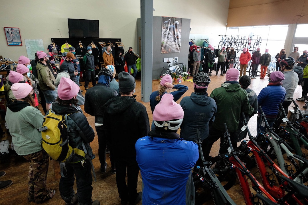 (Francisco Kjolseth  | The Salt Lake Tribune) People gather in a big circle at Hangar 15 bicycle shop in Millcreek to tell stories of Louis Holian, Sarah Moughamian and Thomas Steinbrecher on Sunday, Feb. 14, 2021, three of the four who died in an avalanche on Saturday, Feb. 6. Stephanie Hopkins who was in a different group that day was swept up in the same avalanche.