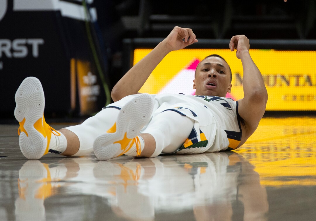 (Rick Egan  |  The Salt Lake Tribune)     Utah Jazz guard Dante Exum (11) looks at the ref after colliding with Miami Heat guard Dwyane Wade (3), in NBA action between Utah Jazz and Miami Heat, at Vivint Smart Home Arena Wednesday, Dec. 12, 2018.