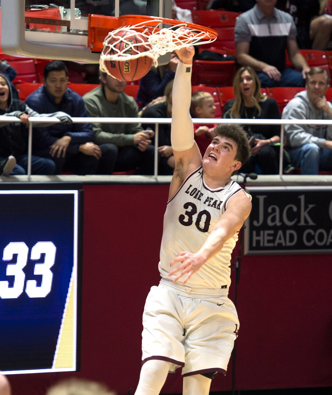 Scott Sommerdorf | The Salt Lake TribuneLone Peak's Jackson Brinkerhoff dunks during second half play. Lone Peak beat Layton 82-47, in a boy's 6A semi-final, FrIday, March. 2, 2018.