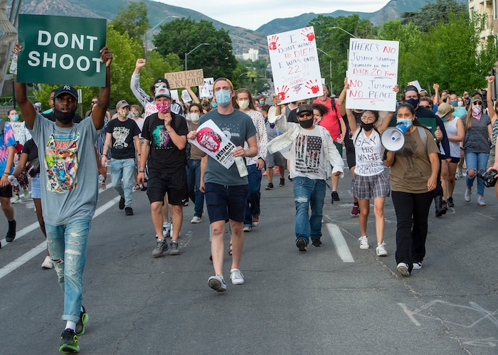 (Rick Egan  |  The Salt Lake Tribune)     Protesters march down 600 South in Salt Lake City, during a Justice for Bernardo rally on Thursday, June 25, 2020.