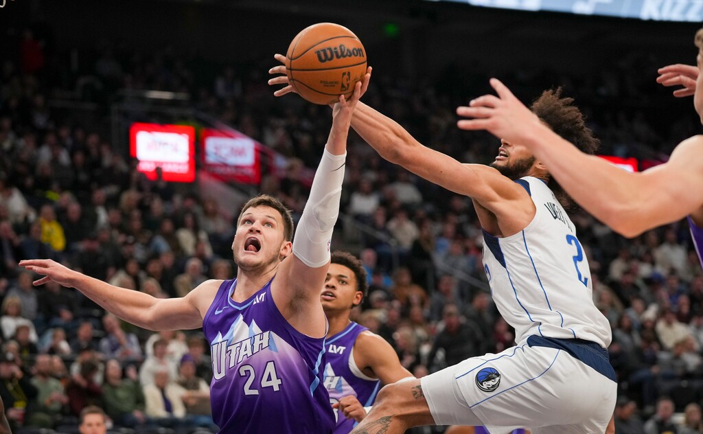 (Bethany Baker  |  The Salt Lake Tribune) Utah Jazz center Walker Kessler (24) blocks a shot by Dallas Mavericks center Dereck Lively II (2) during the game at the Delta Center in Salt Lake City on Saturday, Nov. 30, 2024.