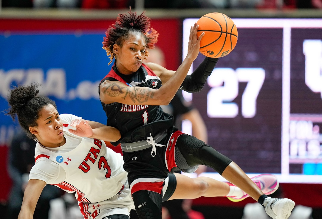 (Francisco Kjolseth | The Salt Lake Tribune) Utah Utes guard Lani White (3) and Gardner-Webb Runnin' Bulldogs guard Ki'Ari Cain (1) collide during the first-round college basketball game in the NCAA Tournament, Friday, March 17, 2023, in Salt Lake City, Utah.
