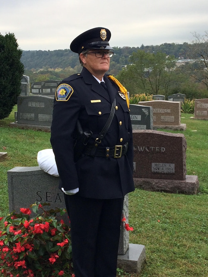 (Courtesy of Utah Department of Corrections)  Utah Corrections Honor Guard Commander Sue Partridge stands at attention during a ceremony held for Officer Edwin J. Fisher. Fisher was killed June 1, 1955, by an inmate at the Utah State Prison and was laid to rest in an unmarked grave until Wednesday, Oct. 11, 2017, when the Utah Department of Corrections and Utah Law Enforcement Memorial board dedicated a headstone at his Frankfort, Ky., burial site.