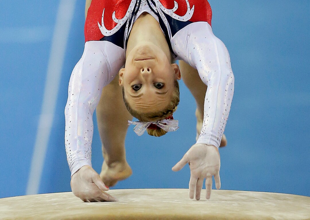 Mykayla Skinner of the United States performs on the vault during the women's vault final of the Artistic Gymnastics World Championship at the Guangxi Gymnasium in Nanning, capital of southwest China's Guangxi Zhuang Autonomous Region Saturday, Oct. 11, 2014. (AP Photo/Andy Wong)