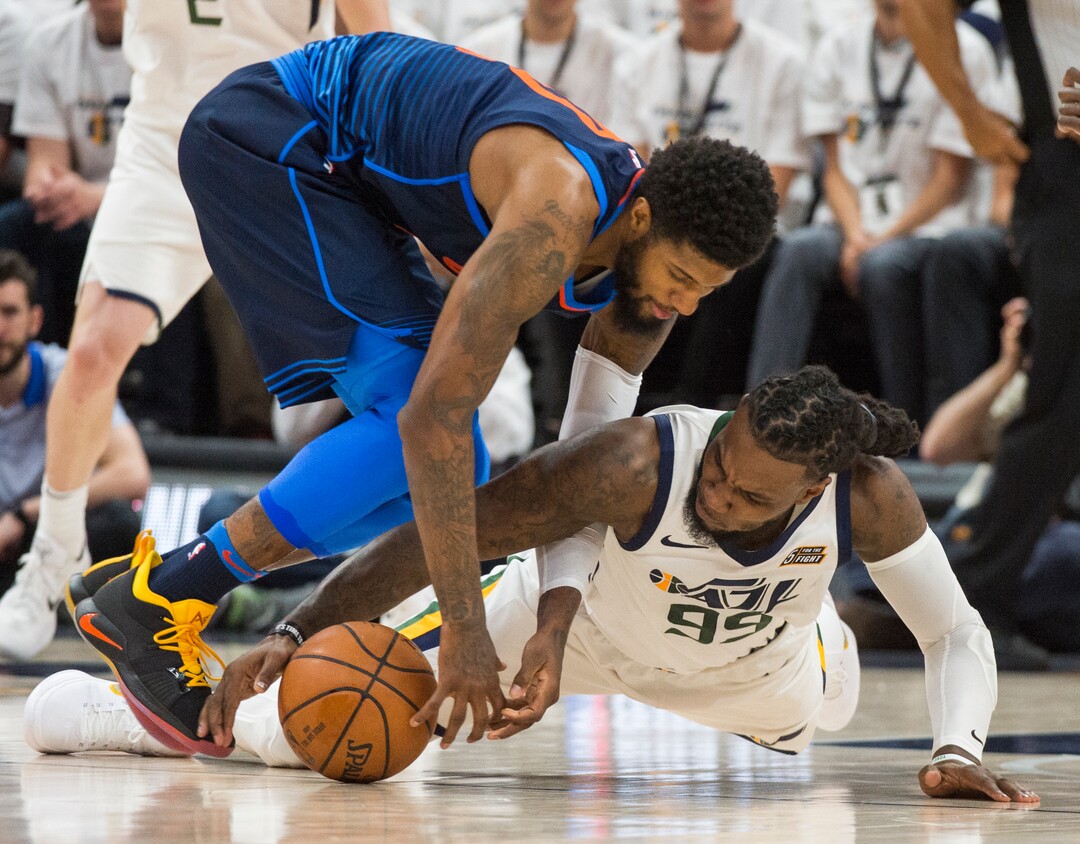 (Rick Egan  |  The Salt Lake Tribune)    Oklahoma City Thunder forward Paul George (13) goes for a loose ball along with Utah Jazz forward Jae Crowder (99), in game 4, NBA playoff action between Utah Jazz and Oklahoma City Thunder, in Salt Lake City, Monday April 23, 2018.